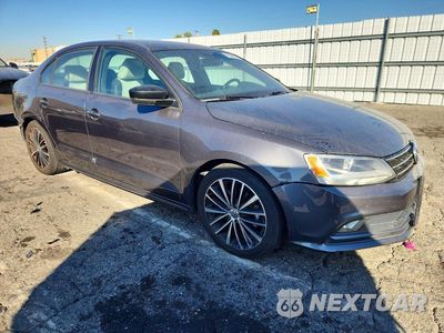 Czwarte zdjęcie samochodu z boku: 2016 VOLKSWAGEN JETTA SPORT VIN:3VWD17AJ2GM400774 - miniatura