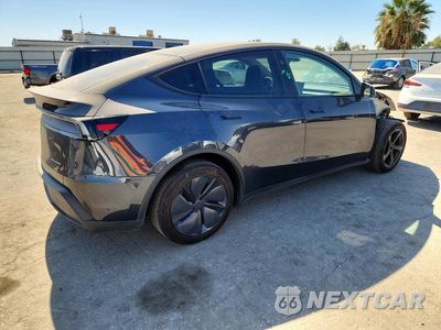 Trzecie zdjęcie samochodu z tyłu: 2026 TESLA MODEL Y VIN:7SAYGDEE0TF454185 - miniatura