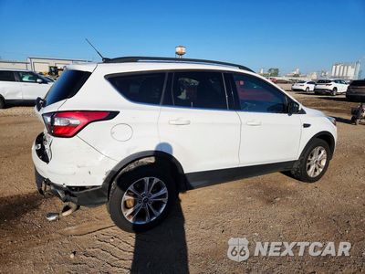 Trzecie zdjęcie samochodu z tyłu: 2017 FORD ESCAPE SE VIN:1FMCU9GD8HUE66788 - miniatura