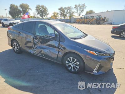 Czwarte zdjęcie samochodu z boku: 2021 TOYOTA PRIUS PRIME XLE VIN:JTDKAMFP1M3167330 - miniatura