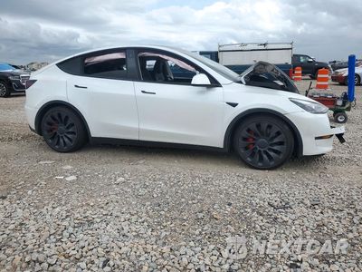 Czwarte zdjęcie samochodu z boku: 2023 TESLA MODEL Y VIN:7SAYGDEF9PF713481 - miniatura