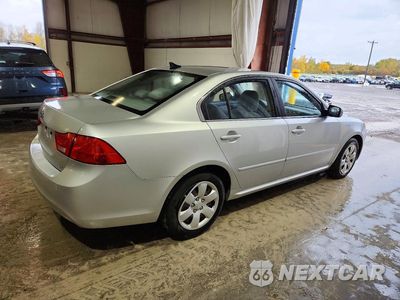 Trzecie zdjęcie samochodu z tyłu: 2009 KIA OPTIMA LX VIN:KNAGE228295317354 - miniatura