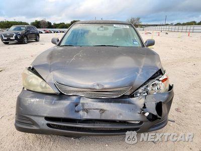 Piąte zdjęcie samochodu w środku: 2003 TOYOTA CAMRY LE VIN:4T1BE32K13U671311 - miniatura