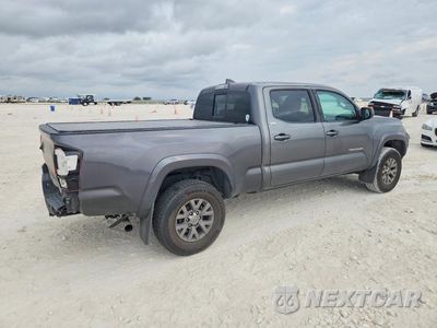 Trzecie zdjęcie samochodu z tyłu: 2019 TOYOTA TACOMA SR5 V6 VIN:3TMBZ5DN1KM019982 - miniatura