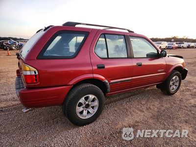 Trzecie zdjęcie samochodu z tyłu: 1999 HONDA PASSPORT EX VIN:4S6CK58WXX4411005 - miniatura