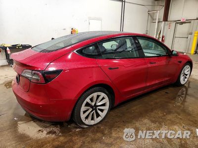 Trzecie zdjęcie samochodu z tyłu: 2023 TESLA MODEL 3 VIN:5YJ3E1EA2PF450217 - miniatura