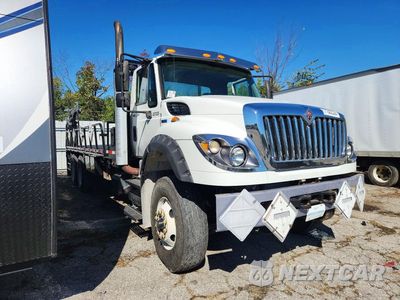 Czwarte zdjęcie samochodu z boku: 2014 INTERNATIONAL 7600 FLAT BED TRUCK VIN:1HTGSSJT4EH790041 - miniatura