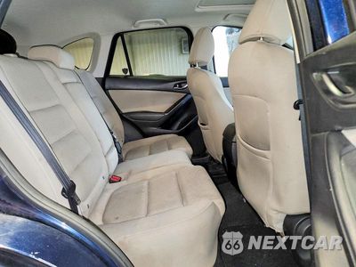 Zdjęcie 11 z 14 samochodu: 2016 MAZDA CX-5 TOURING VIN:JM3KE4CY3G0887100 - miniatura