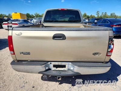 Zdjęcie 6 z 12 samochodu: 2000 FORD F150 VIN:1FTRX17WXYKA58099 - miniatura