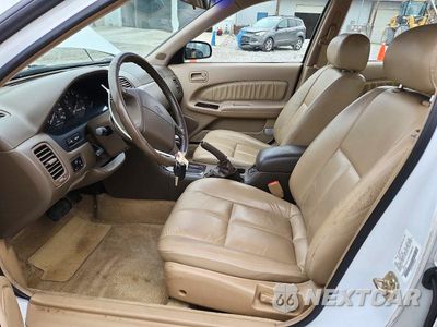 Zdjęcie 7 z 12 samochodu: 1995 NISSAN MAXIMA GXE VIN:JN1CA21D5ST068452 - miniatura