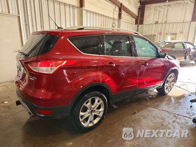 Trzecie zdjęcie samochodu z tyłu: 2016 FORD ESCAPE TITANIUM VIN:1FMCU9J94GUC59186 - miniatura