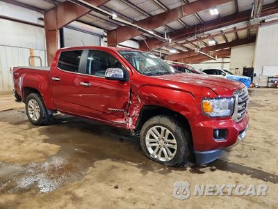 Czwarte zdjęcie samochodu z boku: 2016 GMC CANYON SLT VIN:1GTG6DE36G1358909 - miniatura