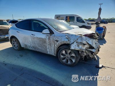 Czwarte zdjęcie samochodu z boku: 2022 TESLA MODEL Y VIN:7SAYGDEE5NF378465 - miniatura
