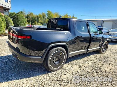 Trzecie zdjęcie samochodu z tyłu: 2025 RIVIAN R1T ADVENTURE VIN:7FCTGBAA8SN039818 - miniatura