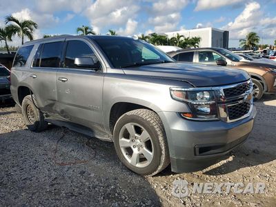 Czwarte zdjęcie samochodu z boku: 2020 CHEVROLET TAHOE C1500 LT VIN:1GNSCBKCXLR174698 - miniatura