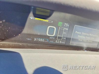 Zdjęcie 9 z 12 samochodu: 2021 TOYOTA PRIUS PRIME XLE VIN:JTDKAMFP7M3188926 - miniatura