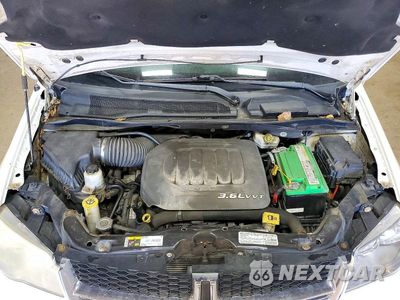 Zdjęcie 12 z 13 samochodu: 2013 DODGE GRAND CARAVAN SXT VIN:2C4RDGCG8DR732434 - miniatura
