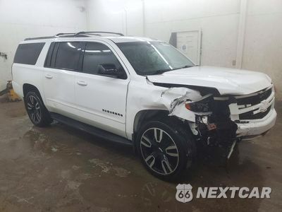 Czwarte zdjęcie samochodu z boku: 2018 CHEVROLET SUBURBAN K1500 PREMIER VIN:1GNSKJKC1JR303776 - miniatura