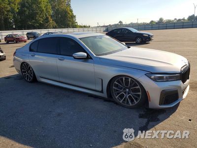 Czwarte zdjęcie samochodu z boku: 2020 BMW 750 XI VIN:WBA7U2C00LGM26760 - miniatura