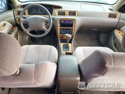 Zdjęcie 8 z 12 samochodu: 1999 TOYOTA CAMRY LE VIN:4T1BG22K5XU595926 - miniatura