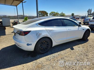 Trzecie zdjęcie samochodu z tyłu: 2019 TESLA MODEL 3 VIN:5YJ3E1EA5KF482474 - miniatura