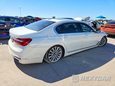 Trzecie zdjęcie samochodu z tyłu: 2018 BMW 740 I VIN:WBA7E2C53JB216298 - miniatura