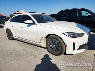 Czwarte zdjęcie samochodu z boku: 2024 BMW I4 EDRIVE 35 VIN:WBY43AW08RFS29234 - miniatura