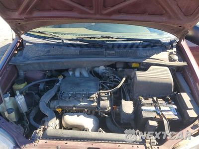 Zdjęcie 12 z 13 samochodu: 1998 TOYOTA SIENNA XLE VIN:4T3ZF13C0WU011974 - miniatura