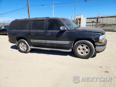 Czwarte zdjęcie samochodu z boku: 2003 CHEVROLET SUBURBAN C1500 VIN:1GNEC16T43J192615 - miniatura