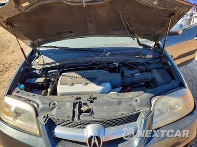 Zdjęcie 12 z 13 samochodu: 2004 ACURA MDX TOURING VIN:2HNYD18864H523526 - miniatura