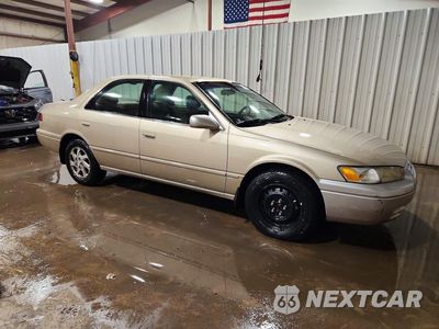Czwarte zdjęcie samochodu z boku: 1999 TOYOTA CAMRY LE V6 VIN:JT2BF22K2X0159784 - miniatura