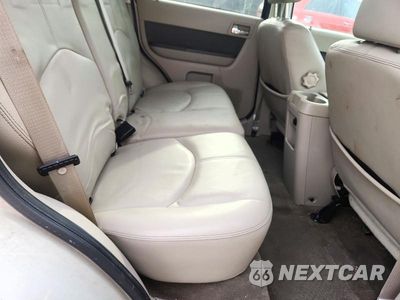 Zdjęcie 10 z 12 samochodu: 2009 MERCURY MARINER PREMIER VIN:4M2CU97G49KJ04625 - miniatura