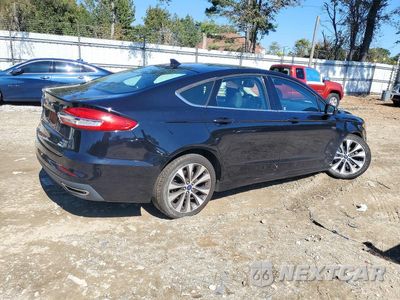 Trzecie zdjęcie samochodu z tyłu: 2019 FORD FUSION SE VIN:3FA6P0T99KR270482 - miniatura