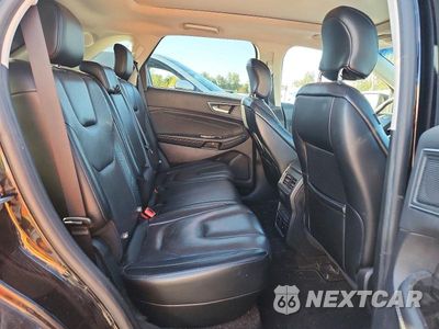 Zdjęcie 11 z 13 samochodu: 2019 FORD EDGE TITANIUM VIN:2FMPK4K9XKBB53865 - miniatura