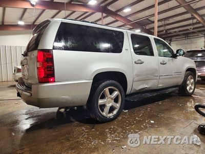 Trzecie zdjęcie samochodu z tyłu: 2013 CHEVROLET SUBURBAN K1500 LTZ VIN:1GNSKKE71DR211348 - miniatura