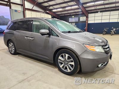 Czwarte zdjęcie samochodu z boku: 2016 HONDA ODYSSEY TOURING VIN:5FNRL5H94GB041662 - miniatura