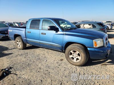 Czwarte zdjęcie samochodu z boku: 2005 DODGE DAKOTA QUAD SLT VIN:1D3HW48N25S149764 - miniatura