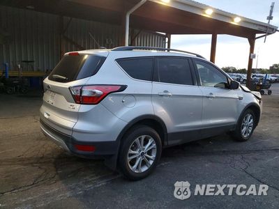 Trzecie zdjęcie samochodu z tyłu: 2018 FORD ESCAPE SE VIN:1FMCU9GD3JUD37069 - miniatura