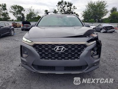 Piąte zdjęcie samochodu w środku: 2020 HYUNDAI SANTA FE LIMITED VIN:5NMS53AD1LH161409 - miniatura