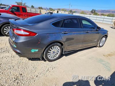 Trzecie zdjęcie samochodu z tyłu: 2013 FORD FUSION TITANIUM PHEV VIN:3FA6P0SU0DR332425 - miniatura
