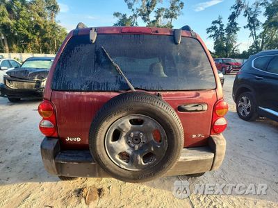 Zdjęcie 6 z 13 samochodu: 2003 JEEP LIBERTY SPORT VIN:1J4GK48K93W622176 - miniatura