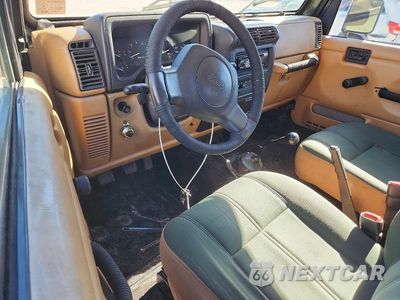 Zdjęcie 8 z 12 samochodu: 1997 JEEP WRANGLER / TJ SAHARA VIN:1J4FY49SXVP496853 - miniatura