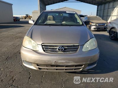 Piąte zdjęcie samochodu w środku: 2004 TOYOTA COROLLA LE VIN:1NXBR38E34Z328278 - miniatura