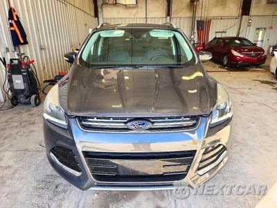 Piąte zdjęcie samochodu w środku: 2015 FORD ESCAPE TITANIUM VIN:1FMCU0JXXFUA89232 - miniatura