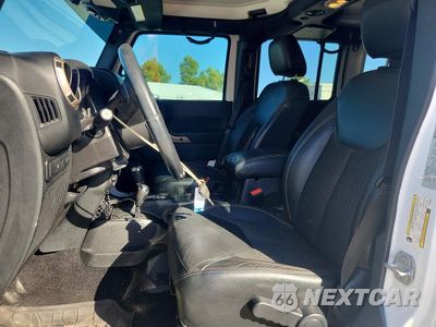 Zdjęcie 7 z 14 samochodu: 2016 JEEP WRANGLER UNLIMITED SAHARA VIN:1C4BJWEG9GL328508 - miniatura