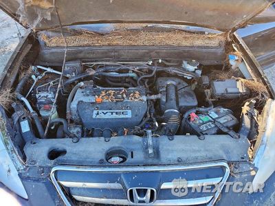 Zdjęcie 12 z 13 samochodu: 2005 HONDA CR-V EX VIN:JHLRD77875C029309 - miniatura