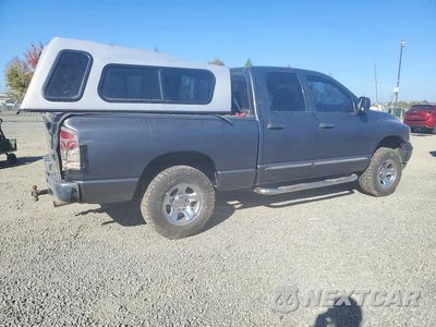 Trzecie zdjęcie samochodu z tyłu: 2002 DODGE RAM 1500 VIN:1D7HU18Z92J252770 - miniatura