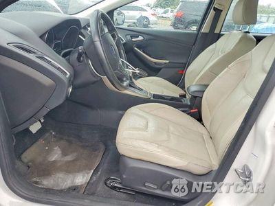 Zdjęcie 7 z 13 samochodu: 2016 FORD FOCUS TITANIUM VIN:1FADP3J27GL232835 - miniatura