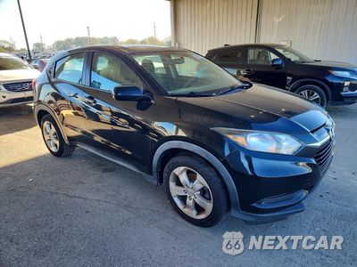 Czwarte zdjęcie samochodu z boku: 2016 HONDA HR-V LX VIN:3CZRU6H32GM749607 - miniatura