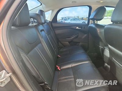 Zdjęcie 10 z 13 samochodu: 2013 FORD FOCUS TITANIUM VIN:1FADP3J24DL383692 - miniatura